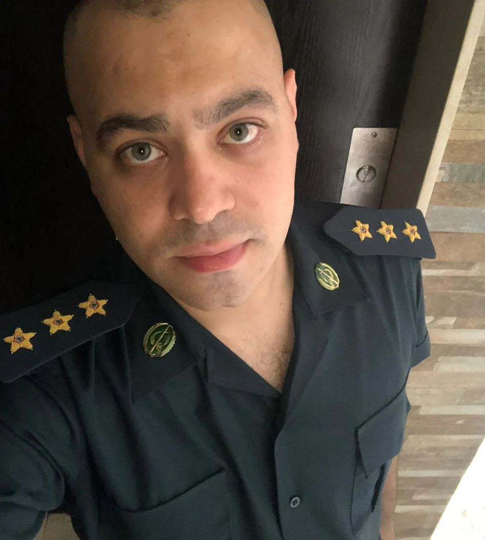 Kassem Ali Nasser in his military uniform before his streaming career